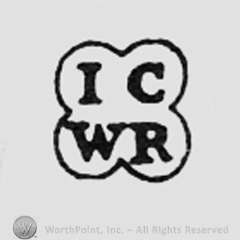 Letters IC WR inside a shape like a clover.