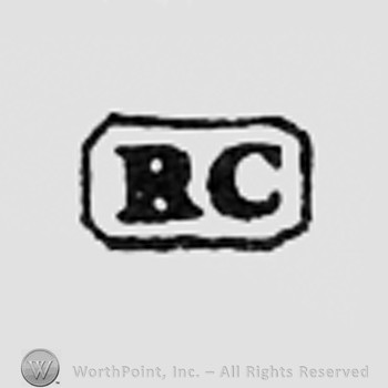 Letters RC inside a rectangle.