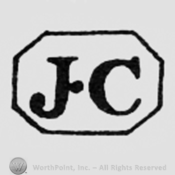 Letters JC inside a rectangle.