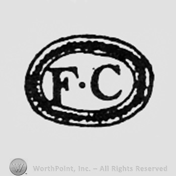 Letters FC inside an oval.