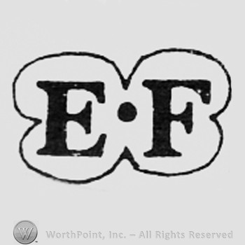 Letters EF inside a frame like a clover.