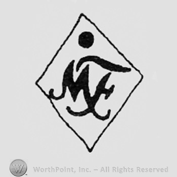 Letters MF inside a diamond.