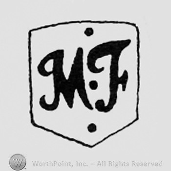 Letters MF on a shield.