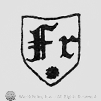 Letters FR on a shield.