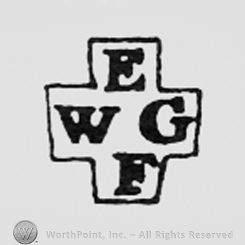 Letters WG and EF inside a frame like a cross.