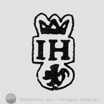 Crowned letters IH above a lion.