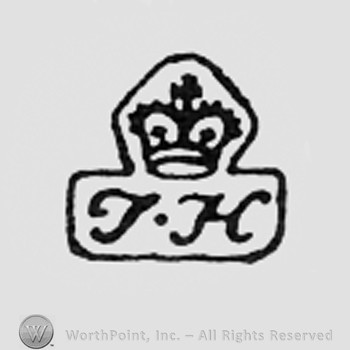Crowned letters TH.