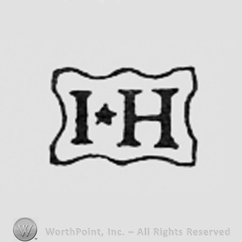 Letters IH and a star between the letters.