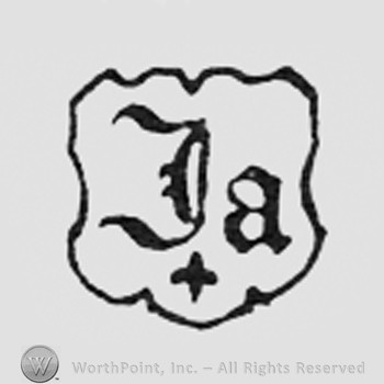 Letters JA on a shield.
