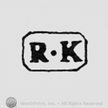 Letters RK inside a rectangle.
