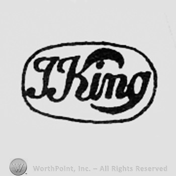 J.KING written inside an oval.