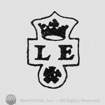 Crowned letters LE and a star bellow.