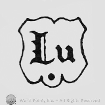 Letters LU above a dot.