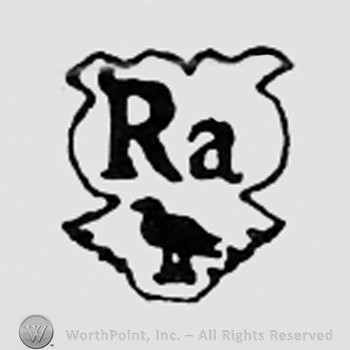 Letters RA and a bird, all on a shield.