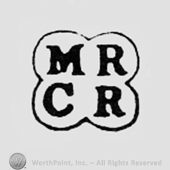 Letters MR CR inside a shape like a clover.