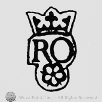 Crowned letters RO above a little flower.