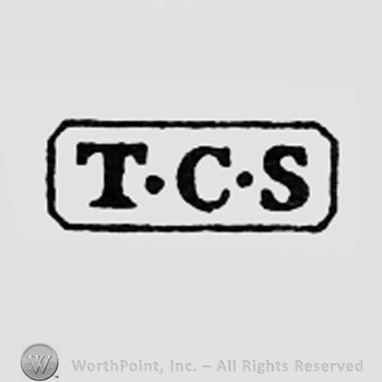 Letters TCS inside a rectangle.