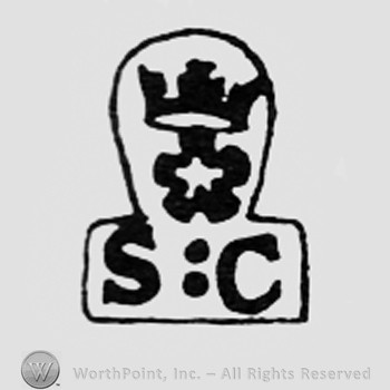Crown and flower above letters SC.