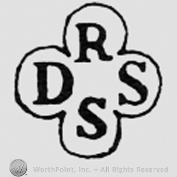 Letters DS RS inside a shape like a clover.