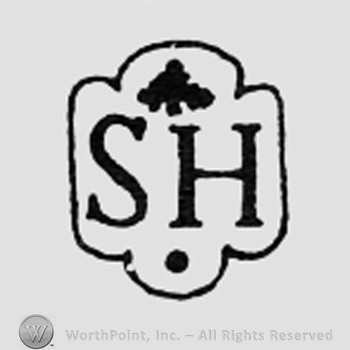 Fleur-de-lis above letters SH.
