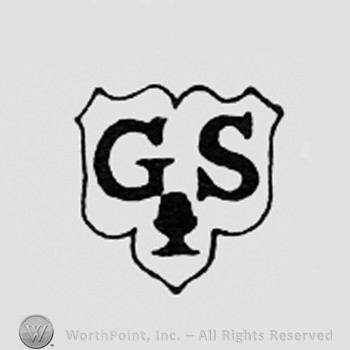 Letters GS above a fleur-de-lis.