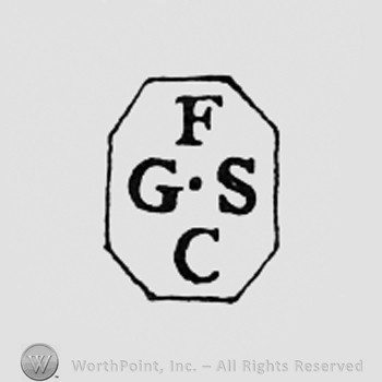 Letters FGCS inside a hexagone.