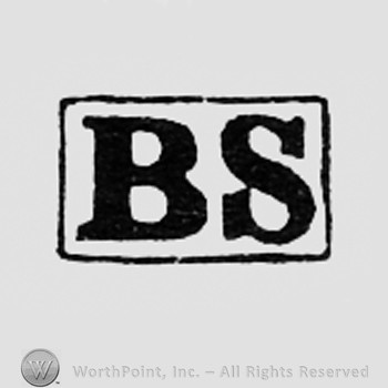 Letters BS inside a rectangle.