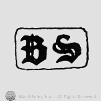 Letters BS inside a rectangle.