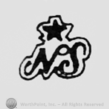 Star above letters NS.