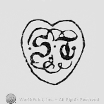 Monogram of letters ST inside a shape like a heart.