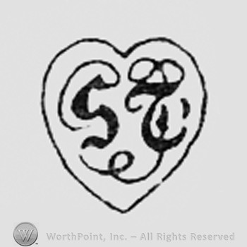 Monogram of letters ST inside a shape like a heart.
