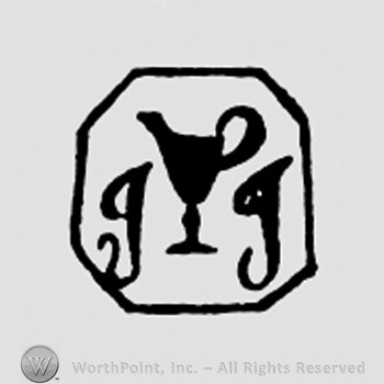 Cup between letters JT, all inside a hexagone.