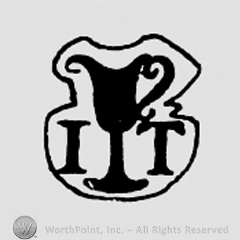 Cup between letters JT.