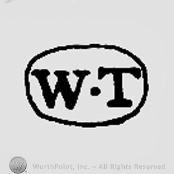 Letters WT inside an oval.