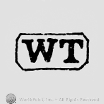 Letters WT inside a rectangle.