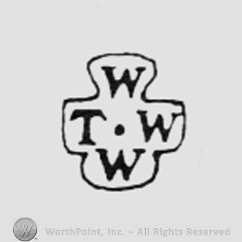 Letters TWWW inside a shape like a cross.