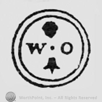 Letters WO, dot and a fleur-de-lis, all inside a double circle.
