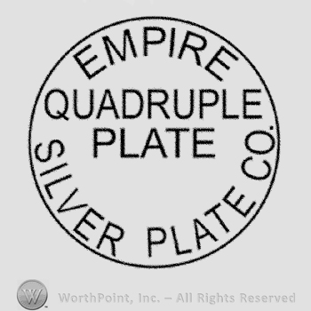 Empire Silver Plate Co written with uppercase letters around Quadruple Plate written also with uppercase letters, all inside a circle