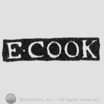 The name E. Cook written with uppercase letters