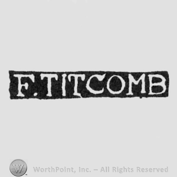 The name F. Titcomb written with uppercase letters