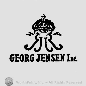 A crown and ,,georg jensen" written under.