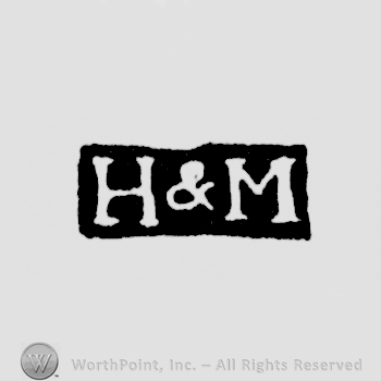 The letters H&M written in uppercase
