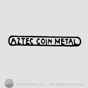The words Aztec Coin Metal written with uppercase letters inside an oval