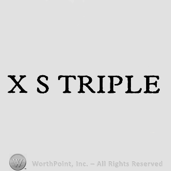The words X S Triple written with uppercase letters. 