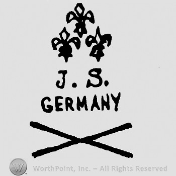 Three fleur de lis symbols and J S Germany written below.