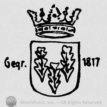 Crown on top of a shield shape with three leaves inside and GEGR 1817 written.