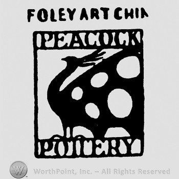 Peacock inside a rectangle with words PEACOCK POTTERY;FOLEY ART CHINA written outside.