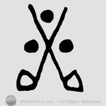 Shape similar with two crossed golf clubs and three dots.