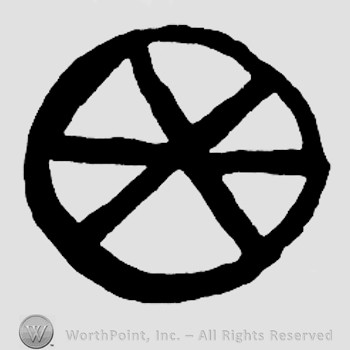 An asterisk inside a circle.