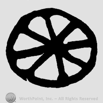 An asterisk inside a circle.